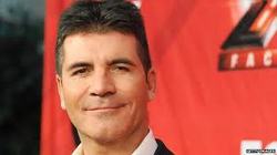 Simon Cowell has called in a "house healer" to improve the energy