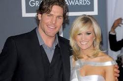 Carrie Underwood does not take husband Mike Fisher on tour
