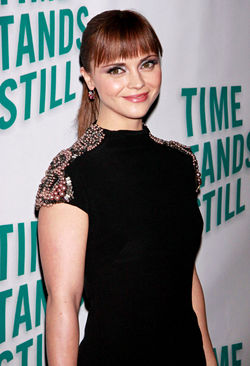 Christina Ricci `playing games` to cope with fame