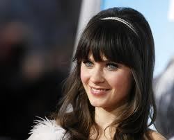 Zooey Deschanel once had a school bully spit in her face