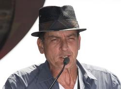 Charlie Sheen has admitted he has three girlfriends