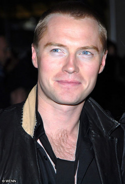 Ronan Keating is trying to "repair" his marriage by moving house