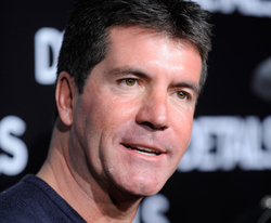 Simon Cowell has "a lot to learn about ladies"