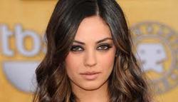 Mila Kunis thinks growing up poor has made her successful