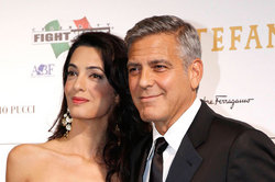 George Clooney with his wife adopt a child