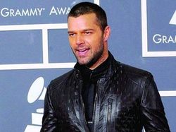 Ricky Martin has to "force" himself to go out