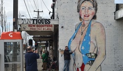 The artist has depicted Clinton in a revealing swimsuit
