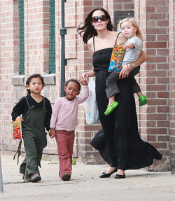 Motherhood turned Jolie into a "little kid" again