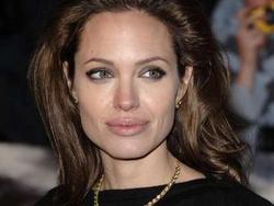 Jolie`s adopted girl conceived during rape: mother