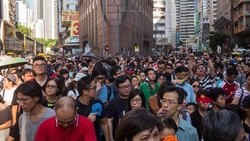 In Hong Kong tens of thousands of people took to the streets