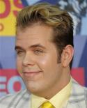Peas manager charged in Perez Hilton fight