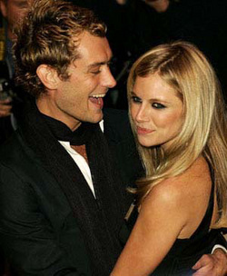 Jude Law and Sienna Miller appeared to be "more than just friends"