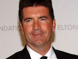 Simon Cowell beats stress by inhaling pure oxygen