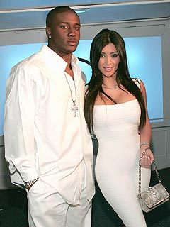 Kim Kardashian and Reggie Bush have split