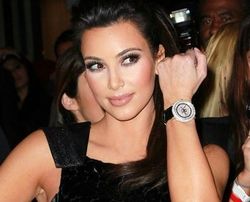 Kim Kardashian is "addicted" to sunglasses
