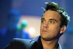 Robbie Williams insists he is still a member of Take That