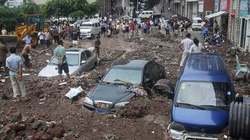 China flood death toll rises to 22