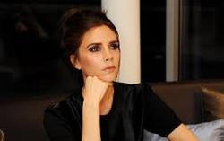 Victoria Beckham works in the nude