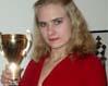 Female world junior champion wins male chess tournament