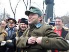 Poroshenko wearing military uniform with the words " Cynical Bandera "
