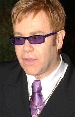 Elton John is to "focus on family life"