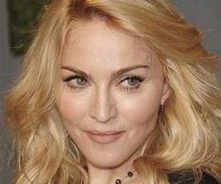 Madonna`s key to relationships is "compromise"