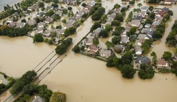 In Texas, thousands of people stuck in the flooded homes