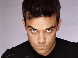 Robbie Williams is to become a father for the first time