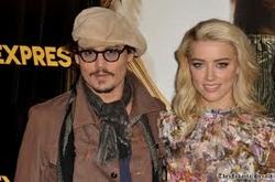 Johnny Depp and Amber Heard are "100 per cent dating"