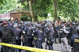 In Portland, police used stun grenades to disperse the protesters