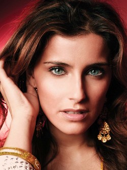 Nelly Furtado is to donate $1 million