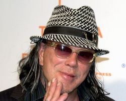 Mickey Rourke has moved to a cheaper apartment