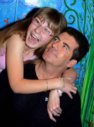 Simon Cowell `more famous than God`