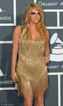 Kesha"s flapper-style dress isn"t the most flattering look for her figure. Think less tinsel, more fabric, Kesha.