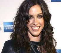 Alanis Morissette is prepared to breastfeed her son until he is six