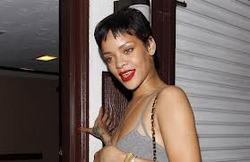 Rihanna is taking Chris Brown to her native Barbados