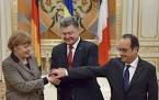 Poroshenko, Hollande and Merkel came out of the meeting room in Minsk
