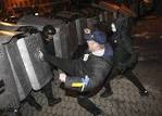 Protesters tried to tear down the fence near the presidential administration building in Kiev

