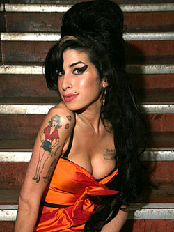 Amy Winehouse and her surgically-enhanced breasts