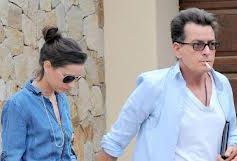 Charlie Sheen is already living with his new porn star girlfriend