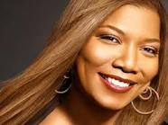 Queen Latifah is "working on" adopting a child