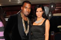 Kanye West is "obsessed" with Kim Kardashian