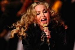 Madonna has decided against wearing a Muslim bridal dress