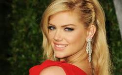Kate Upton is happy to be perceived as a role model