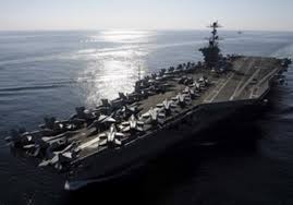 Iranian ships fired a missile near a U.S. aircraft carrier