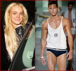 Lindsay Lohan has been spotted "groping and grinding" male model