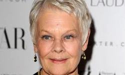 Dame Judi Dench says acting came to her "rescue" when her husband died