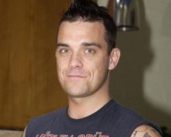 Robbie Williams had an "unexpected bonus" after poisoning