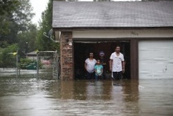 Houston rescuers continue to struggle with flooding
