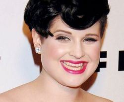 Kelly Osbourne loves spending the day in bed and not brushing her teeth